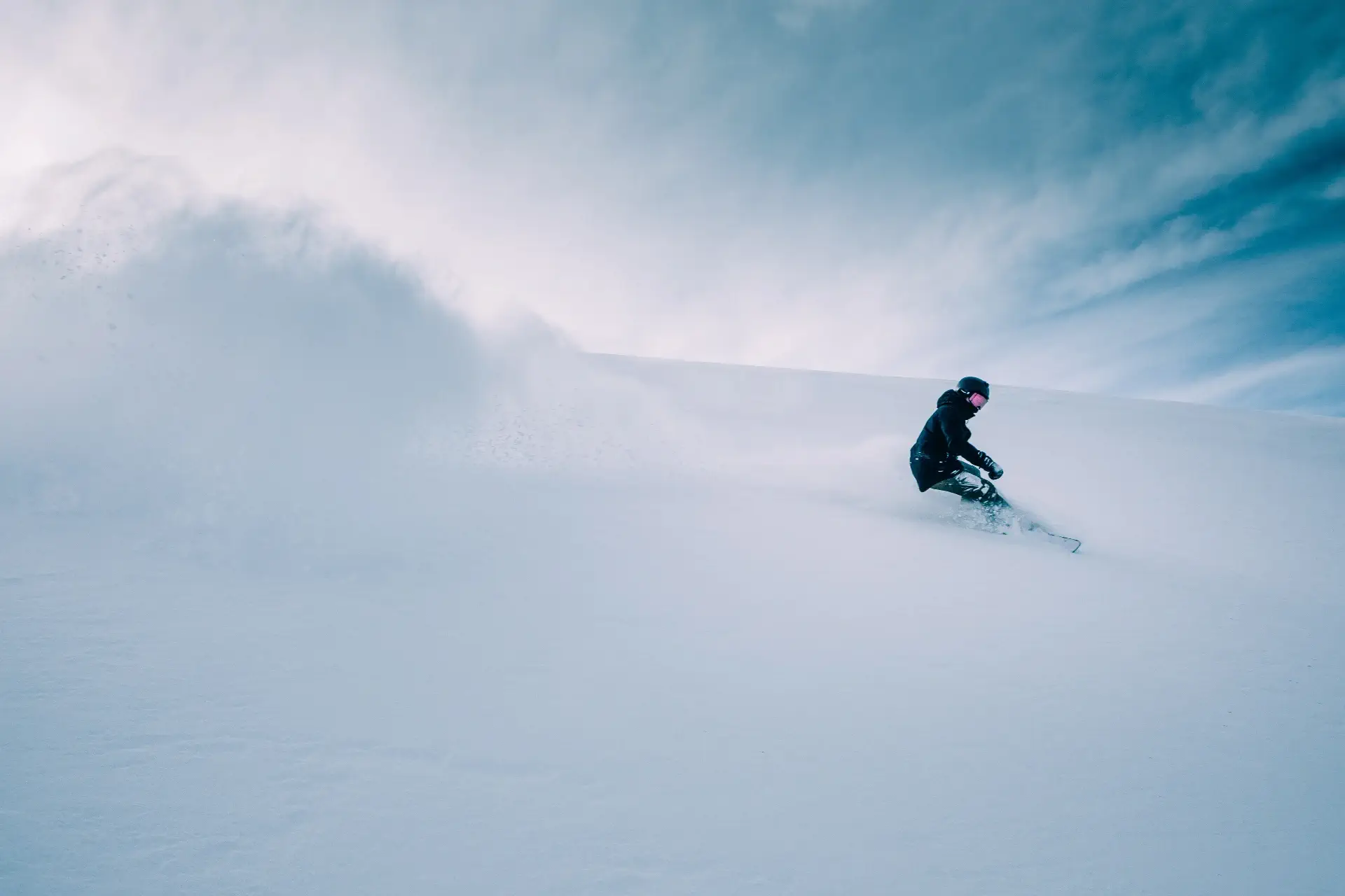 snowboarding riding down the mountain